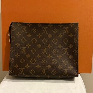 Louis Vuitton Poche Monogram Toiletry Bag